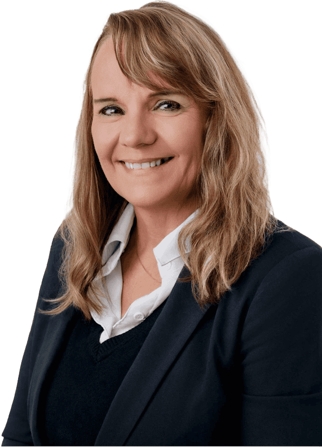 West Michigan real estate agent smiling for a professional photo, promoting homes and properties in the West Michigan area.