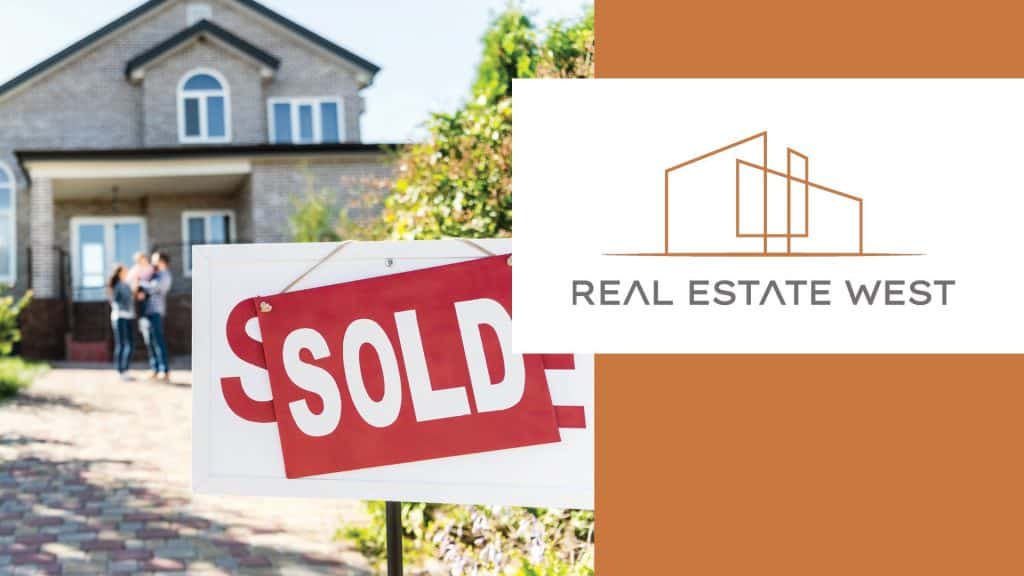 Modern suburban home for sale in West Michigan with sold sign in front.